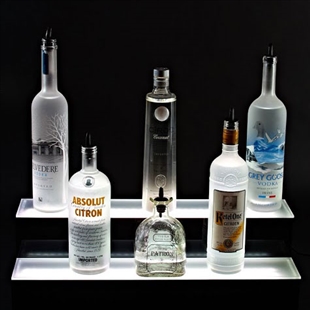 Two Tier Bottle Display with LED lighting and five display bottles on a black background.